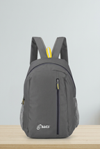 Grey backpack with vertical front zip, side mesh pockets, printed logo and yellow top loop