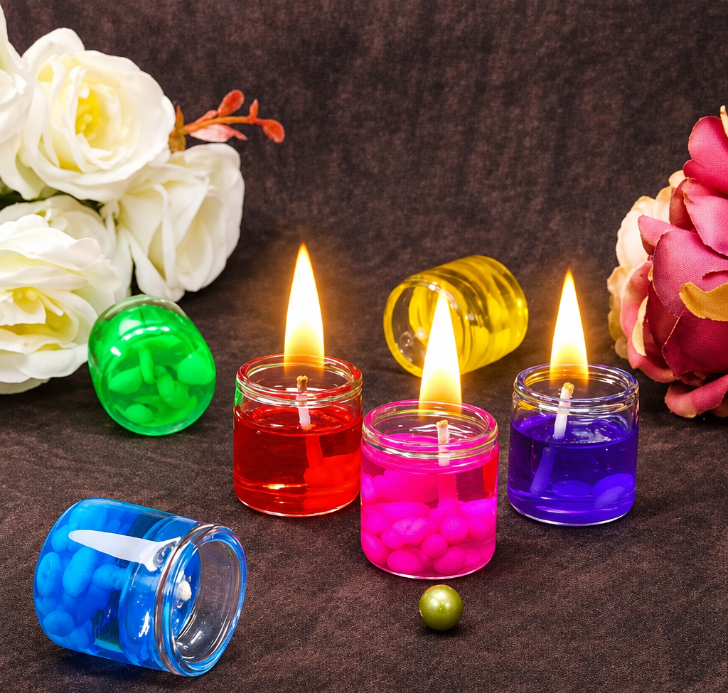 HD lit red, pink, purple and blue gel candles with flowers