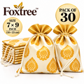 Cream potli drawstring gift bags with gold print, size shown as 7 by 9 inches