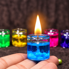 HD blue jelly gel candle burning on a palm with other colours behind