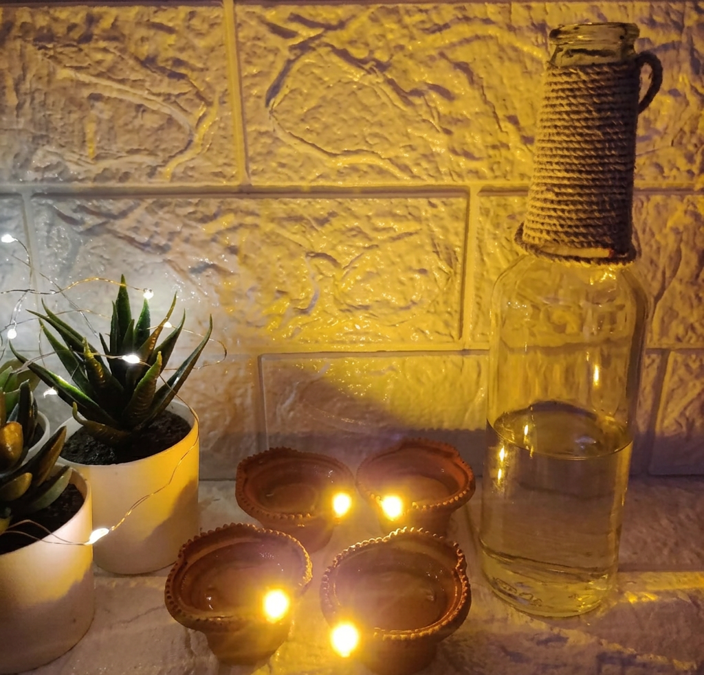 Warm glowing LED diyas displayed as home decor
